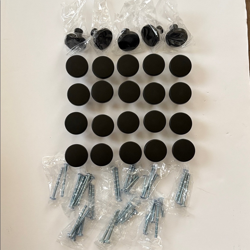 25 Joy Decor cabinet/dresser knobs.  Black matte.  Brand new never used.